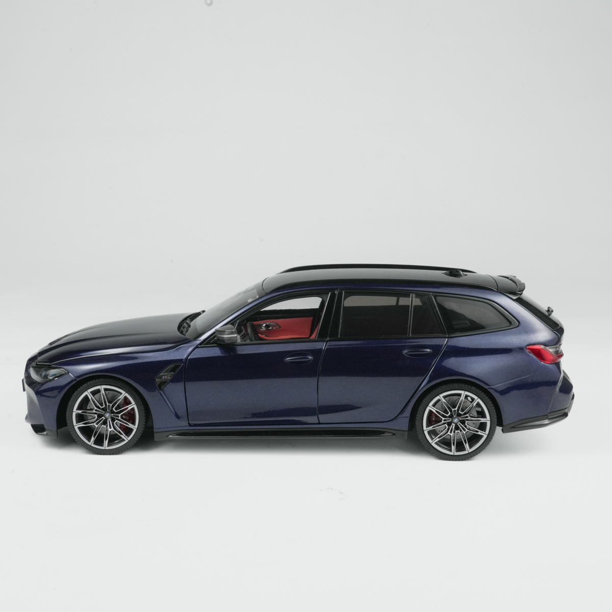 BMW M3 Touring (2024) ტანზანიტისფერი ლურჯი ხედი 4
