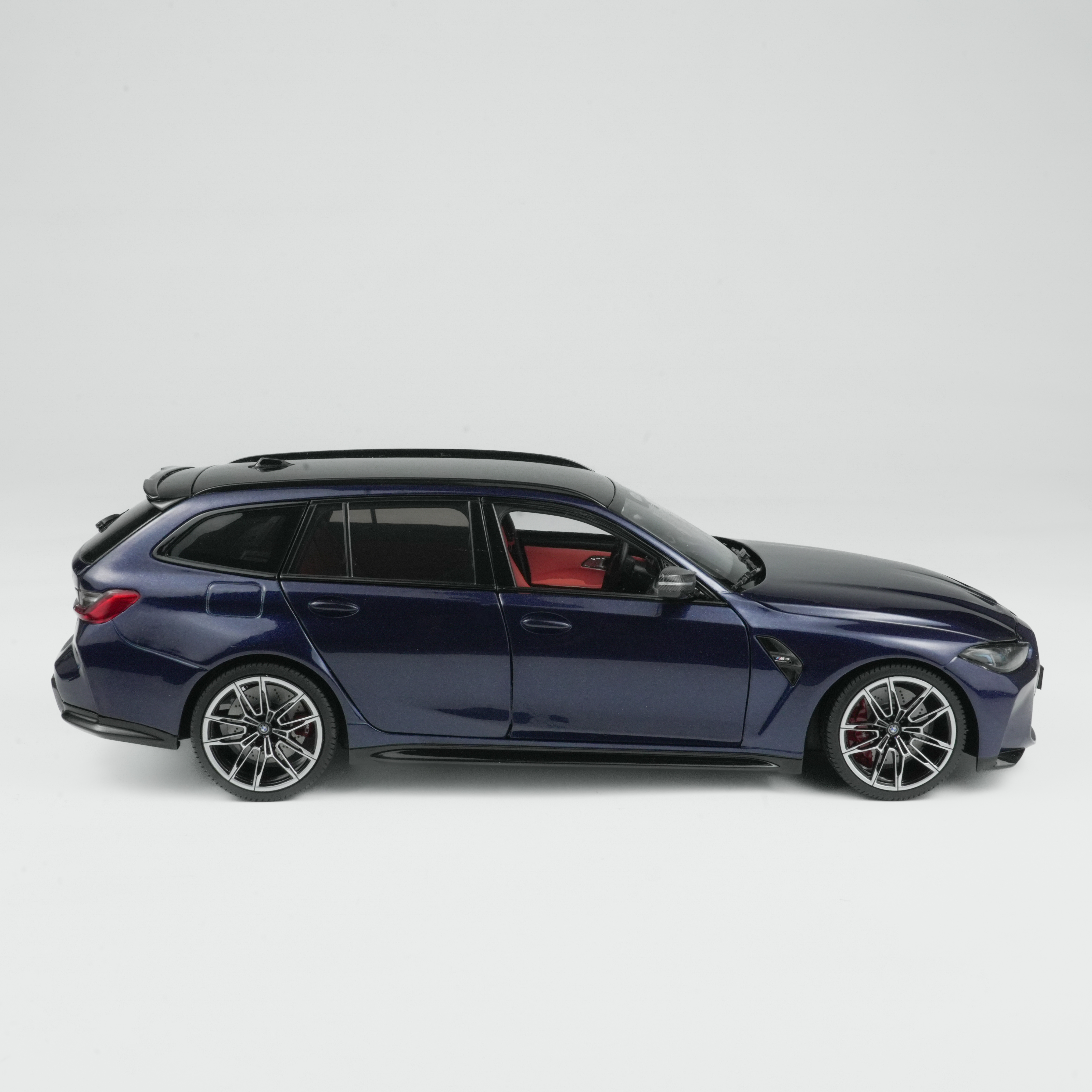 BMW M3 Touring (2024) ტანზანიტისფერი ლურჯი ხედი 8