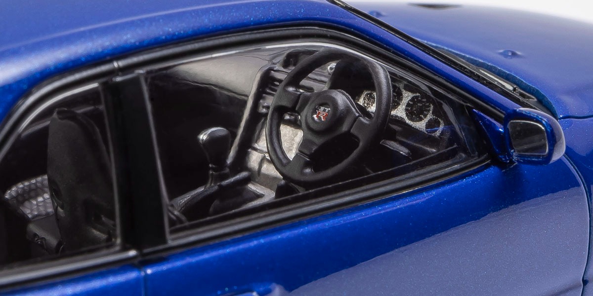 Nissan Skyline R34 GT-R V-Spec II - Bayside Blue ხედი 5